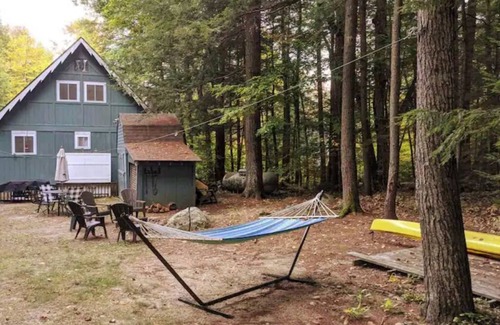 Moultonborough Cabin | Four Bedroom Lakehouse on Winnepesaukee. Waterview, beach, and lots of parking.