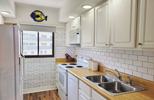 North Litchfield Beach Condo | Fourth Floor Condo Across from Beach Access, Balcony, Pool, Grill Area, Elevator