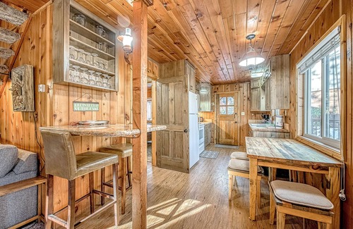 West Village House | Friendly cabin-style home with private gas grill, wood-burning stove, & deck