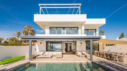 Urbanizacion Costabella Apartment | Frontline 6 BDRM Luxury Villa w Beach Access