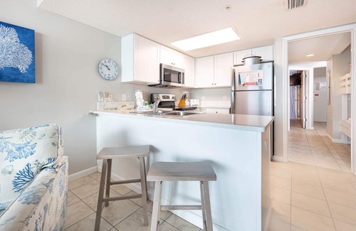 Gulf Shores Condo | Full Kitchen - Bunks - FREE Wifi - Phoenix Hotels…just like a Condo!