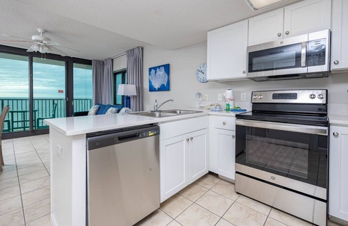 Gulf Shores Condo | Full Kitchen - Bunks - FREE Wifi - Phoenix Hotels…just like a Condo!