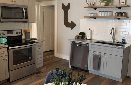 Loveland House | Fully Remodeled ground level unit in Historic District!
