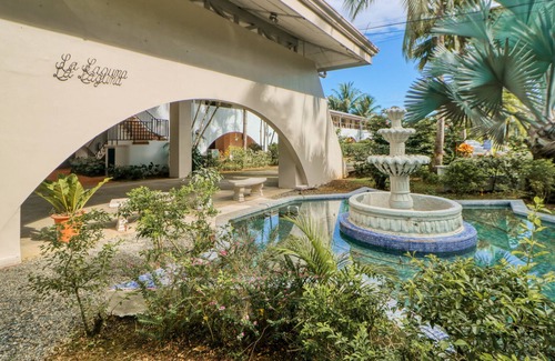 Damas Condo | Fun & bright getaway with furnished balcony, pool, volleyball & tennis courts