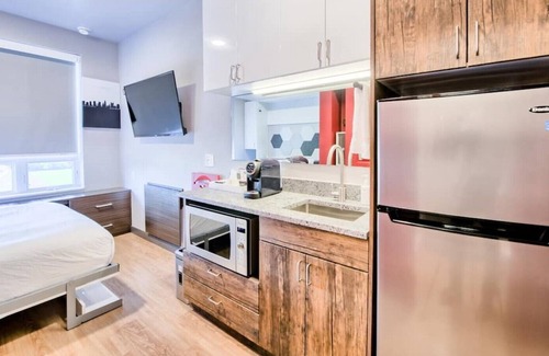 Old North Columbus Apartment | 🔷Fun Micro-Unit w/ Garage Parking Near High St. | Jacuzzi, Fitness Gym, WiFi, +