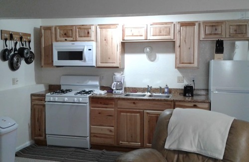 Billings Apartment | Furnished, all-inclusive studio with shared bath. Full Kitchen in unit.