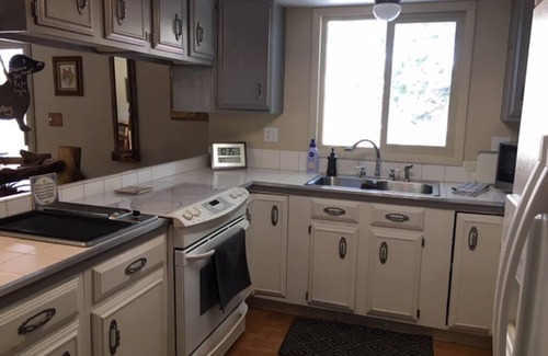 Woodland Park Bed & Breakfast | Furnished bedroom in our Home with full size bed, shared bath