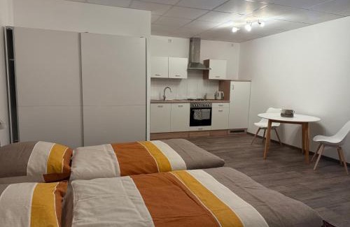 Moosinning Apartment | Gästehaus DAS BLEICHBACH Ferienwohnungen & Apartments