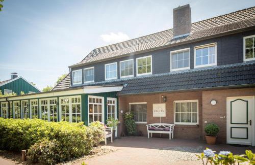 Spiekeroog Apartment | Gästehaus Orion - Wohnung 12