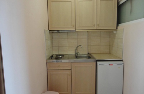 Benitses Apartment | Galini Sea Apartment 4 at the Beach with Wi-Fi, A/C & Garden