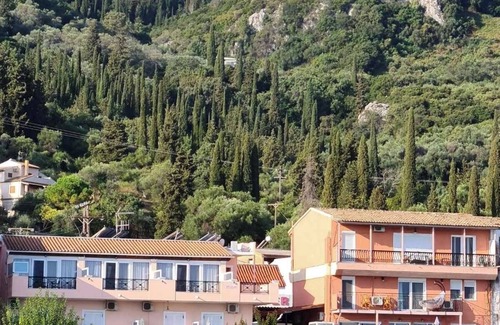 Benitses Apartment | Galini Sea Apartment 4 at the Beach with Wi-Fi, A/C & Garden