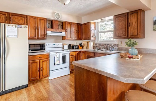 Idaho Falls House | Game room, Deck, Outside Fire pit, AC, Close to Airport & Pet Friendly!