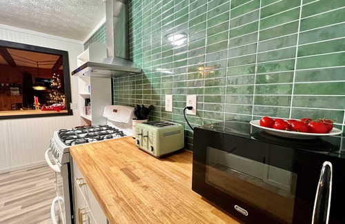 Burnsville House | Game rooms! Fire pits! Screened porch! In town!