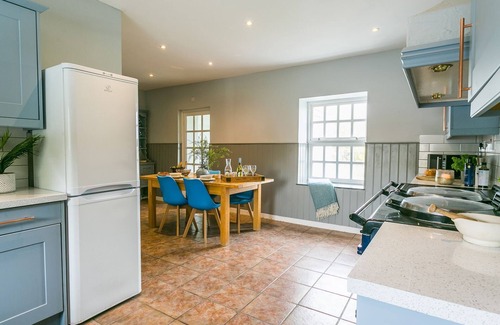 Bryngwran Cottage | Gamekeeper's - a hot tub that sleeps 4 guests in 2 bedrooms