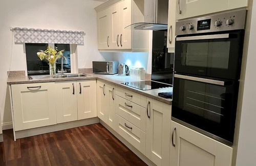 Wing House | Garden Cottage, Maryholme