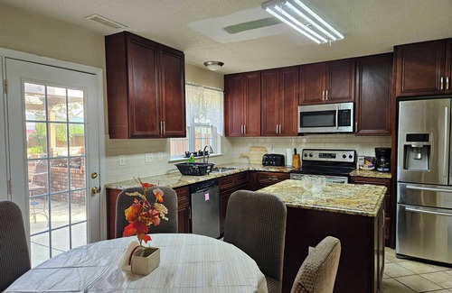 Apex House | Garden Retreat close to Jordan Lake-Screened porch-fenced backyard-large deck