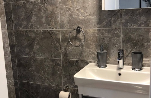 Torba Apartment | Garten-appartement mit Meerblick und 1 Min. Fussweg zum Strand