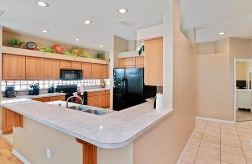 Sunset Lakes Villa | Gated Luxury Villa with Pool-Game Room Near Disney World