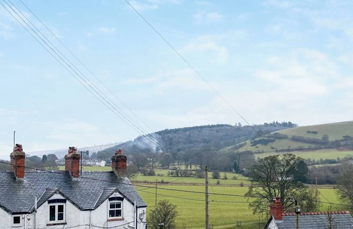 Corwen Cottage | Swan Cottage offers a relaxing space for all the family to enjoy.