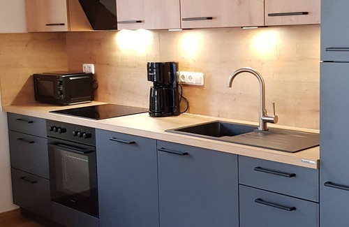 Kiefersfelden Apartment | Gemütliche Ferienwohnung im Modernen Alpenstil mit Blick auf Kaisergebirge