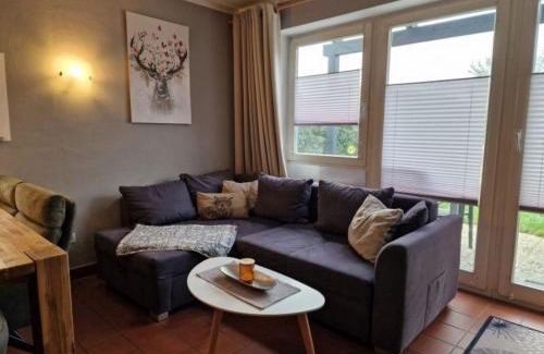 Zandt House | Gemütliches Ferienhaus mit Kamin und eigenem Garten in bayerischem Feriendorf