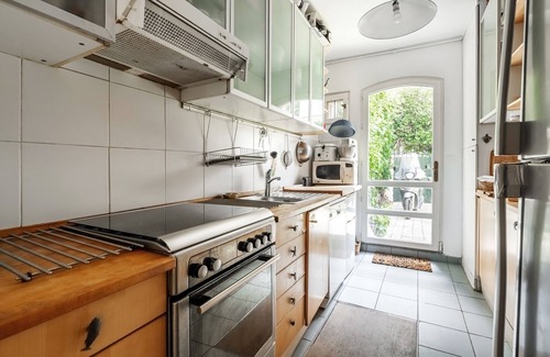 Butte-aux-Cailles Apartment | Gilded Garden Splendour, by Veeve