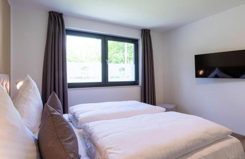 Krakow am See Apartment | Glücksraum - Modernes Apartment mit Panoramablick, Kamin & Wohlfühlambiente