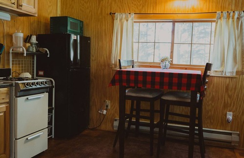 Seeley Lake Cabin | Glacier Cabin at Tamaracks Resort is a cozy cabin with a Seeley Lake view.