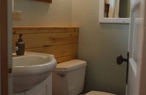 Seeley Lake Cabin | Glacier Cabin at Tamaracks Resort is a cozy cabin with a Seeley Lake view.