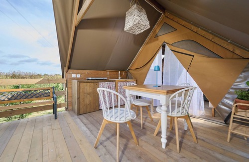Piombino RV Rental | Glamping 'Tenda Safari Vicino Al Mare' with Shared Garden, Wi-Fi and Air Conditioning