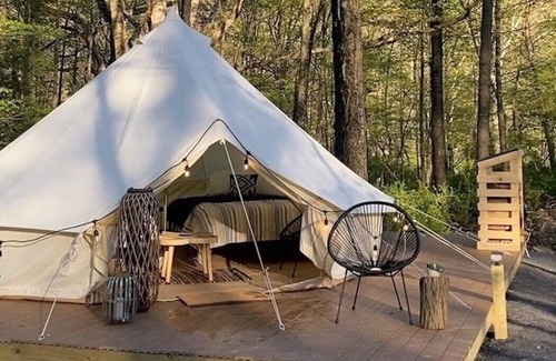 Buffalo Mills RV Rental | Glamping Tent in the Trees at River Mountain Resort