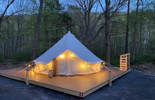 Buffalo Mills RV Rental | Glamping Tent in the Trees at River Mountain Resort