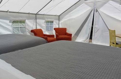 Olney RV Rental | Glamping Wall Tent 7/1 Futon /1 Queen Air Mattress