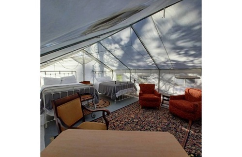 Olney RV Rental | Glamping Wall Tent 8/ 2 Queens