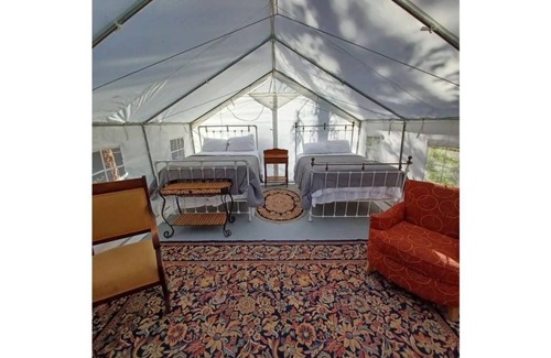 Olney RV Rental | Glamping Wall Tent 8/ 2 Queens