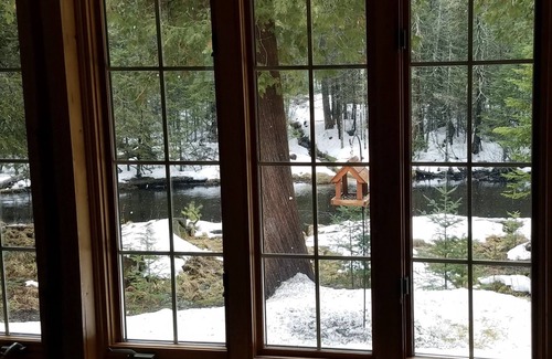 Luzerne Cabin | Gold Fox Lodge - Romantic Riverfront Log Cabin - A Piece of Michigan History!