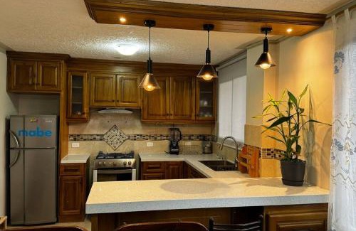 Miguel Egas Cabezas Apartment | Golden Wasi Family