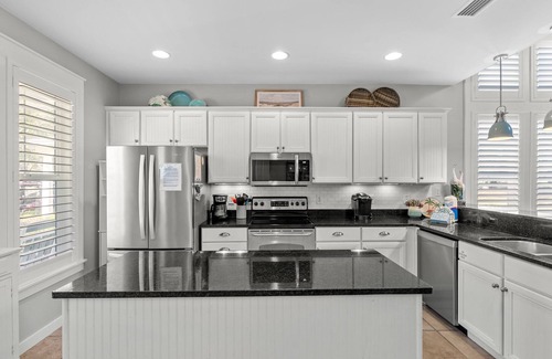 Laurel Grove House | Golf Course Beach Cottage with 2 Golf Carts! Near Beach, Pool, Hot tub, Tram.