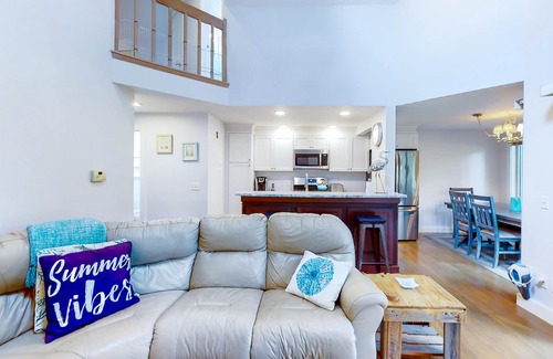 Mews Village House | Golf-course-front townhome with leafy patio & prime location near the beach