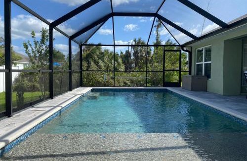 North Port House | Gone Coastal! Large Heated pool home 30 min from beaches!