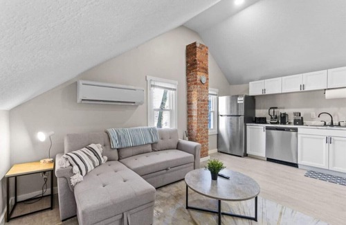 West Central Apartment | Gorg Wooden Beams w/Brick Accents in Downtown Apt