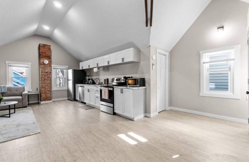 West Central Apartment | Gorg Wooden Beams w/Brick Accents in Downtown Apt