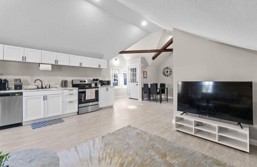 West Central Apartment | Gorg Wooden Beams w/Brick Accents in Downtown Apt