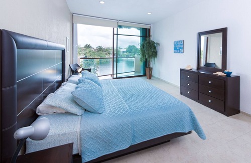 Puerto Aventuras Condo | Gorgeous 3 Bdrm Lagoon Condo Pool Wifi Kayak paddle boards Golf Cart Available