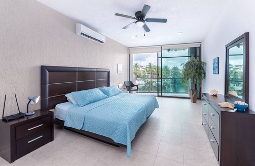 Puerto Aventuras Condo | Gorgeous 3 Bdrm Lagoon Condo Pool Wifi Kayak paddle boards Golf Cart Available