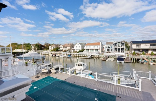 Riviera House | Gorgeous Bay Front property with boat slip and pool