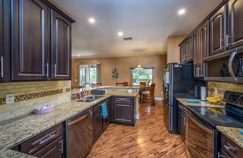Jacarandas House | Gorgeous Cape Coral Home for a Family Getaway, w/amazing Pool & Waterfall Spa!