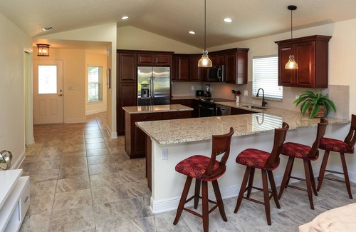 Tavares House | Gorgeous fully furnished home in gated golf community!