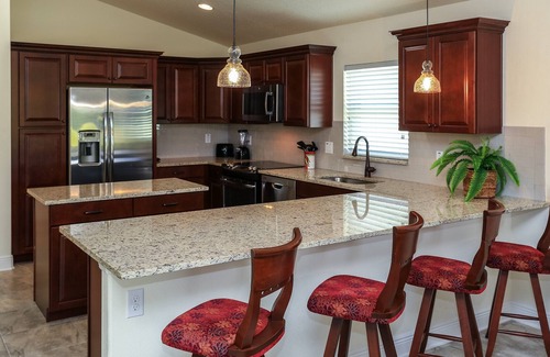 Tavares House | Gorgeous fully furnished home in gated golf community!