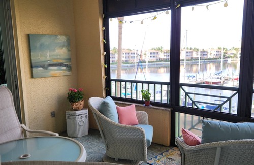 Burnt Store Marina Condo | Gorgeous Harbor View and Magnificent Sunsets! Watch the Manatees play!